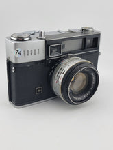 Vintage 1970's Taron Auto EE 35mm Film Camera F1.8 45mm lens. Untested.