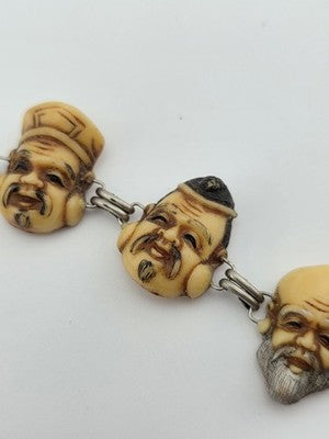 Antique Japanese Figural Face Bracelet Carved Bon Seven Gods Meiji Era. Signed.