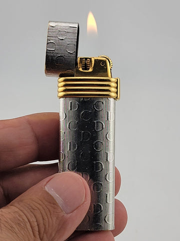 Vintage Christian Dior Lighter Swiss Made CD Logo Silver and Gold Plated. Works.