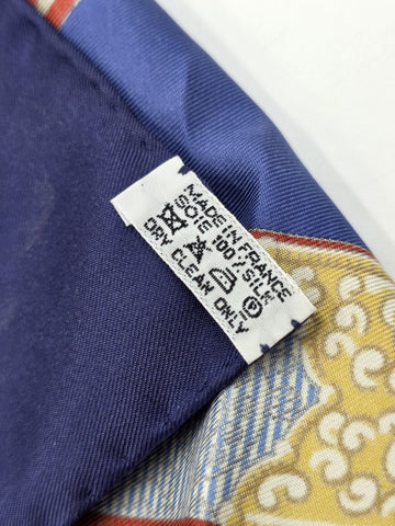 Hermès Silk Scarf 90 “Tibet” Cathy Latham Blue Red Gold Tibetan Jewelry Motif