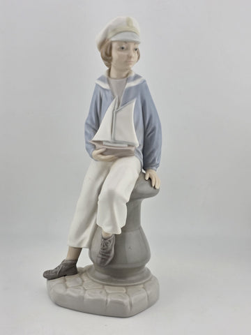 Lladro 4810 Seated Sailor Boy with Yacht Salvador Furio Figurine Glossy
