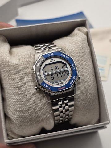 Seiko SMGG21P1 A824 Digital Alarm Chronograph Blue Bezel Watch Box Papers