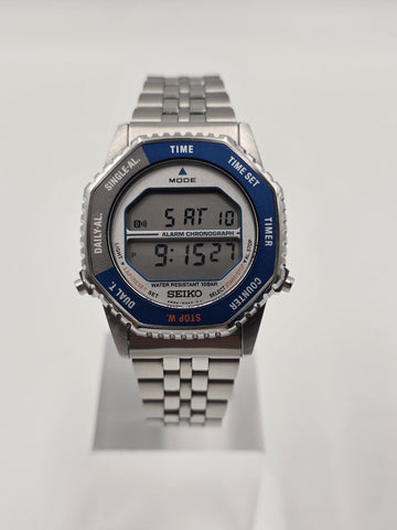 Seiko SMGG21P1 A824 Digital Alarm Chronograph Blue Bezel Watch Box Papers