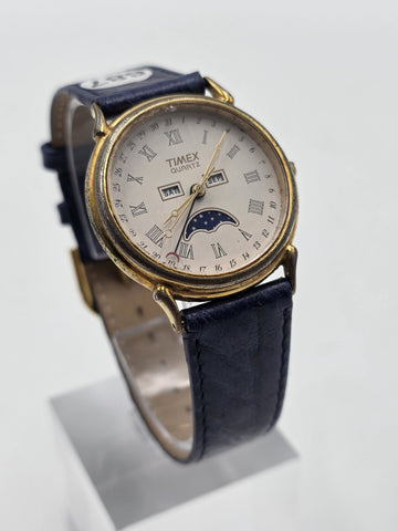 VTG TIMEX TRIPLE DATE MOON PHASE DIAL QUARTZ GOLDEN BLACK DRESS WATCH. WORKING
