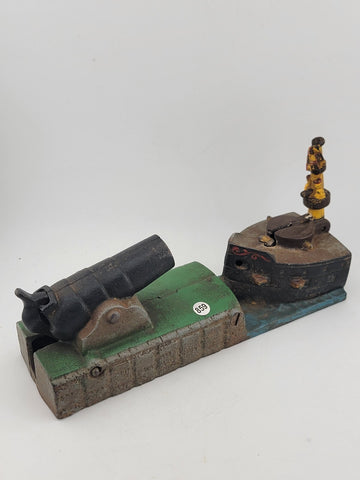 Vintage Reproduction Book of Knowledge Cast Iron Cannon Mechanical Bank.