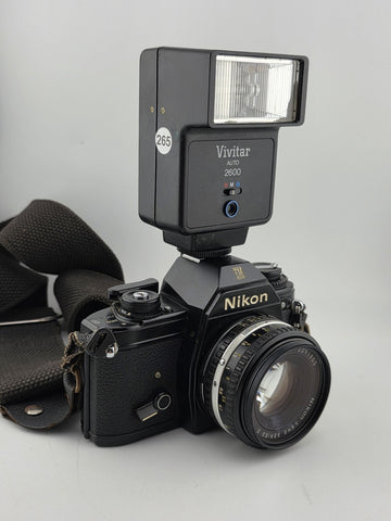 Vintage 70's Nikon EM 35mm Film Camera + 50mm f1.8 Lens + Vivitar Flash Untested