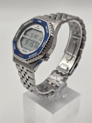 Seiko SMGG21P1 A824 Digital Alarm Chronograph Blue Bezel Watch Box Papers