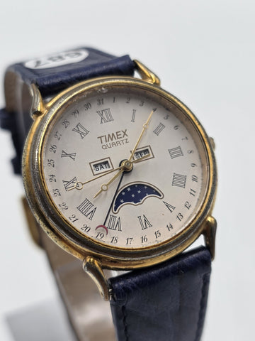 VTG TIMEX TRIPLE DATE MOON PHASE DIAL QUARTZ GOLDEN BLACK DRESS WATCH. WORKING