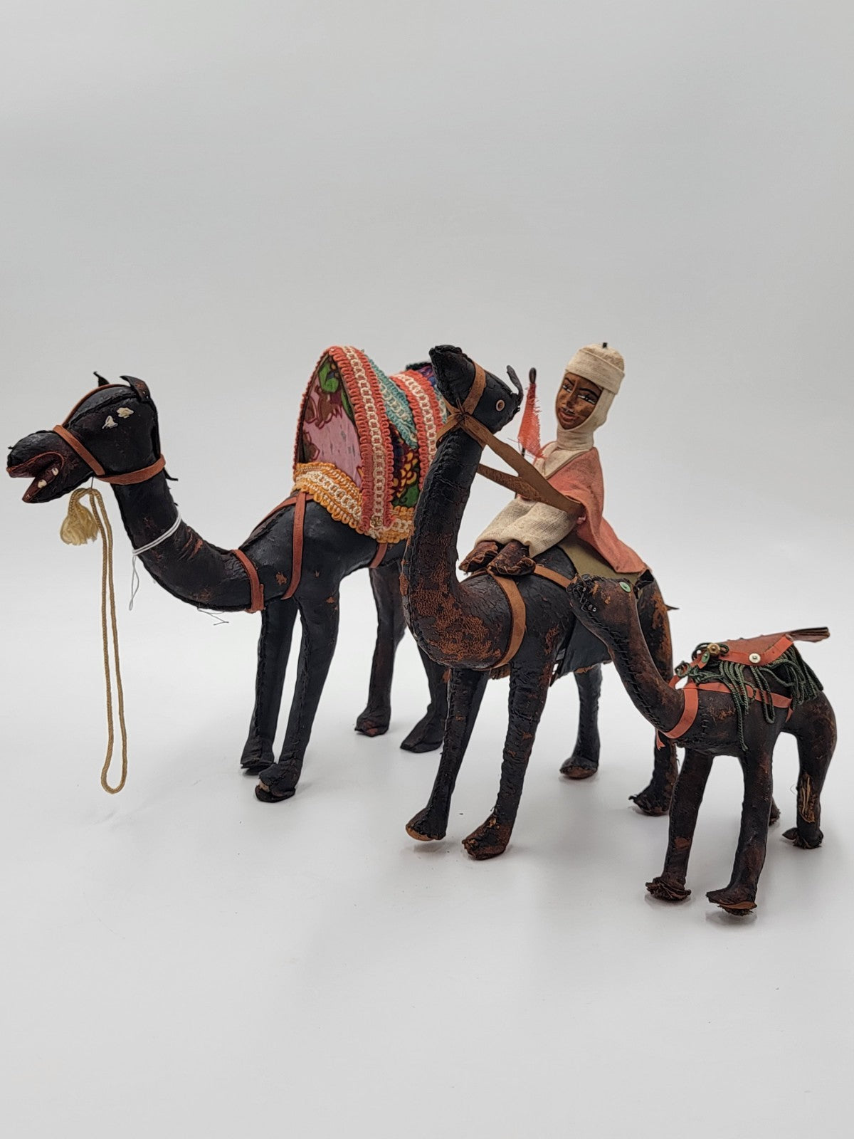 Rare Set Of 3 Antique Handmade Leather Camels W Saddles Nativity. Circa 1910.
