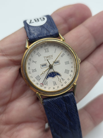 VTG TIMEX TRIPLE DATE MOON PHASE DIAL QUARTZ GOLDEN BLACK DRESS WATCH. WORKING
