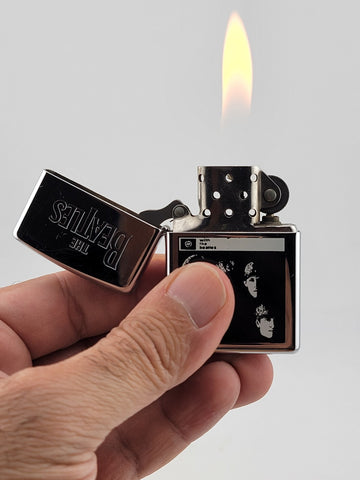 Zippo Lighter The Beatles - John Lennon, Paul McCartney, George & Ringo. Works.