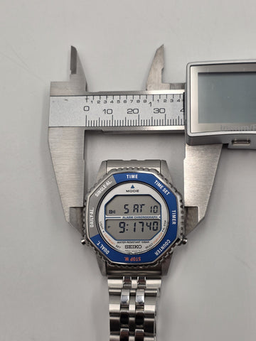 Seiko SMGG21P1 A824 Digital Alarm Chronograph Blue Bezel Watch Box Papers