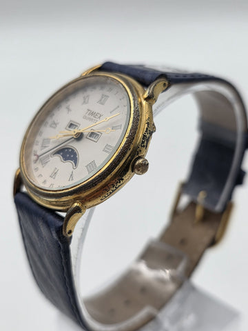 VTG TIMEX TRIPLE DATE MOON PHASE DIAL QUARTZ GOLDEN BLACK DRESS WATCH. WORKING
