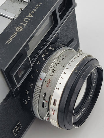 Vintage 1970's Taron Auto EE 35mm Film Camera F1.8 45mm lens. Untested.