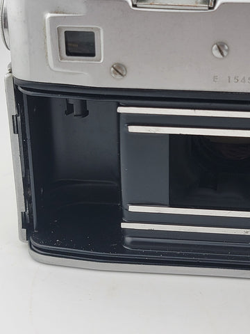 Vintage 1970's Taron Auto EE 35mm Film Camera F1.8 45mm lens. Untested.