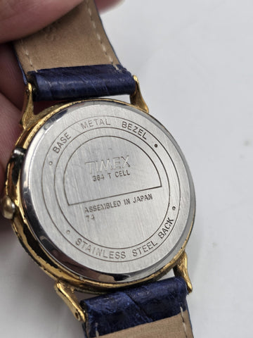 VTG TIMEX TRIPLE DATE MOON PHASE DIAL QUARTZ GOLDEN BLACK DRESS WATCH. WORKING