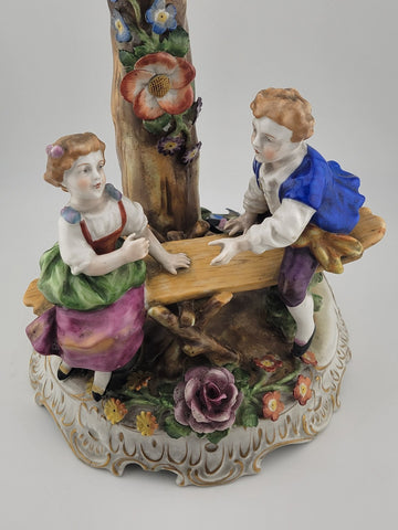 ANTIQUE 19th C DRESDEN VON SCHIERHOLZ BOY & GIRL ON SEESAW FIGURINE. 10.5 in.
