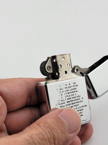 Zippo Lighter The Beatles - John Lennon, Paul McCartney, George & Ringo. Works.