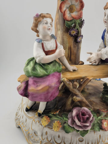 ANTIQUE 19th C DRESDEN VON SCHIERHOLZ BOY & GIRL ON SEESAW FIGURINE. 10.5 in.