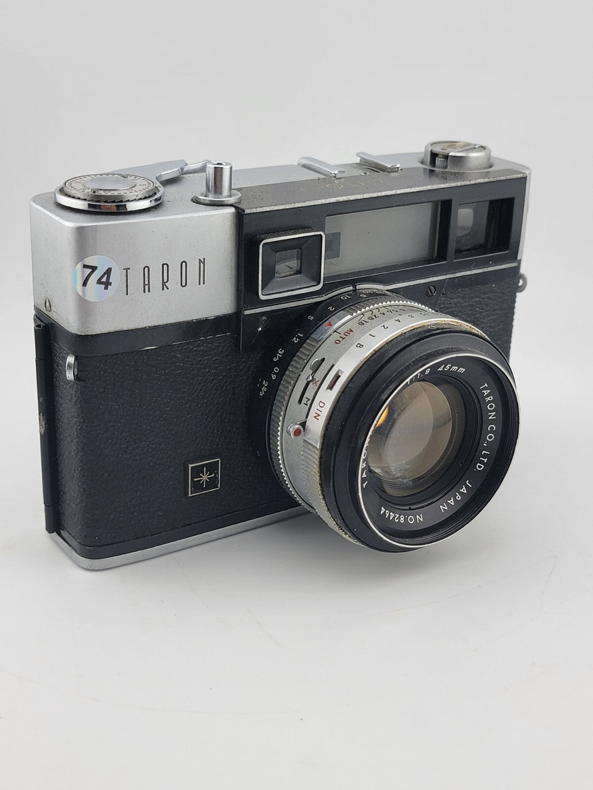 Vintage 1970's Taron Auto EE 35mm Film Camera F1.8 45mm lens. Untested.