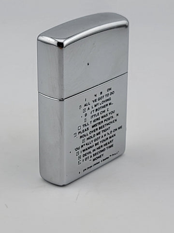 Zippo Lighter The Beatles - John Lennon, Paul McCartney, George & Ringo. Works.