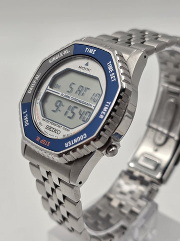Seiko SMGG21P1 A824 Digital Alarm Chronograph Blue Bezel Watch Box Papers