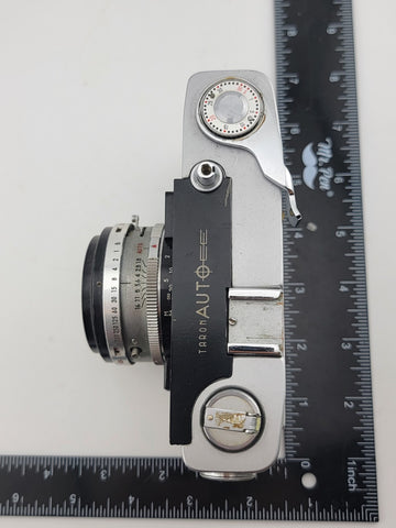 Vintage 1970's Taron Auto EE 35mm Film Camera F1.8 45mm lens. Untested.