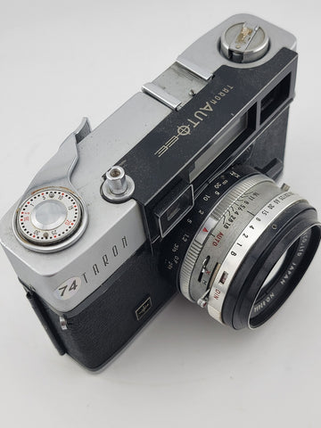 Vintage 1970's Taron Auto EE 35mm Film Camera F1.8 45mm lens. Untested.
