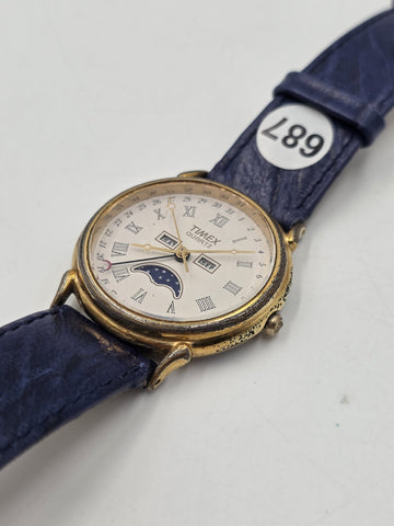 VTG TIMEX TRIPLE DATE MOON PHASE DIAL QUARTZ GOLDEN BLACK DRESS WATCH. WORKING